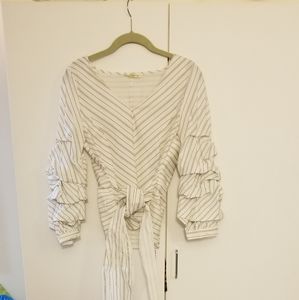 V-neck blouse with rushed sleeves.  Black/white striped design - size xs.